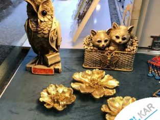 مجسمه های دکوری دیوارکوب